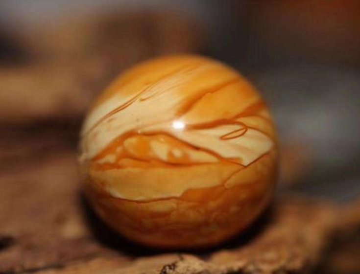 《鬼吹灯》中雮尘珠是如何解除诅咒的呢？