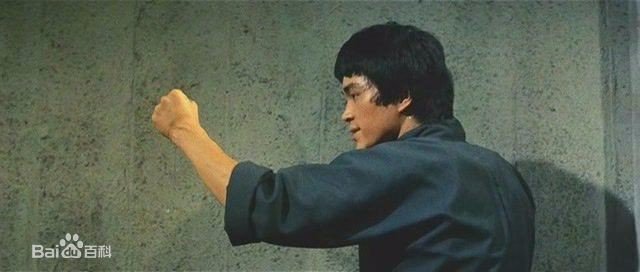 想问一下专家，李小龙到底有没有打过黑市拳赛，有没有和黑市拳高手唐龙比过武，黑市拳里的唐龙和在《死亡