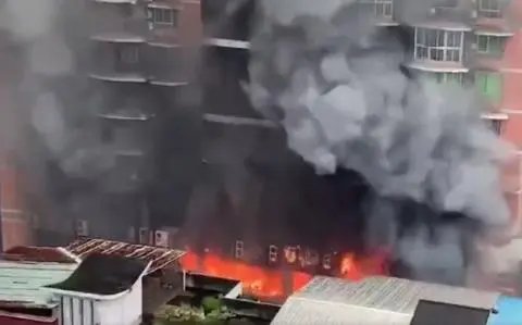 重庆渝州交易城门市火灾损失达数千万元，起火的主要原因是什么？