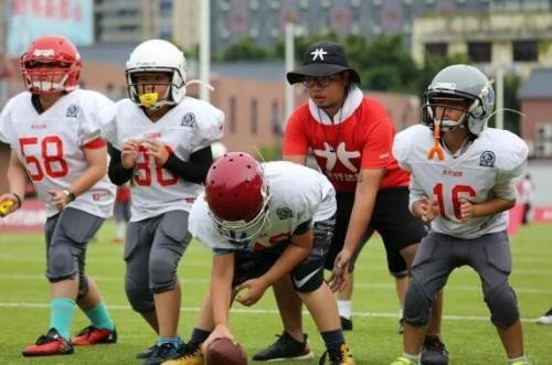 达阵（touch down)的引申意义是什么？
